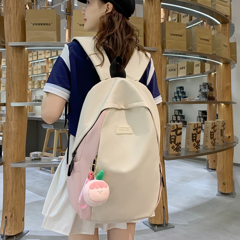高校生 リュック 二色配色かわいい果物チャーム付き学生バッグ