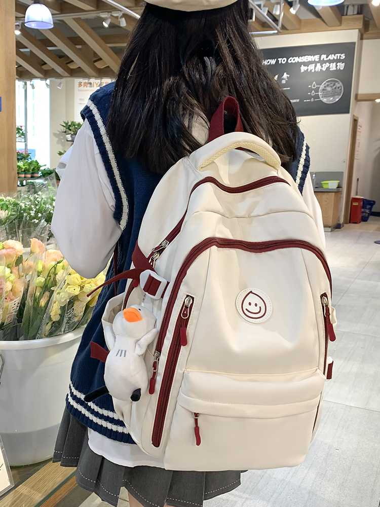 高校生 リュック 笑顔マーク付き学生向けマルチポケットリュック