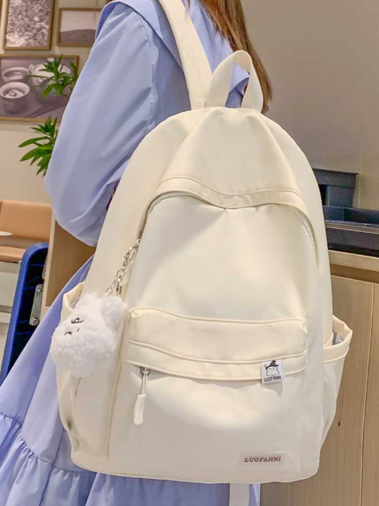 高校生 リュック ふわもこチャーム付き シンプルデイパック