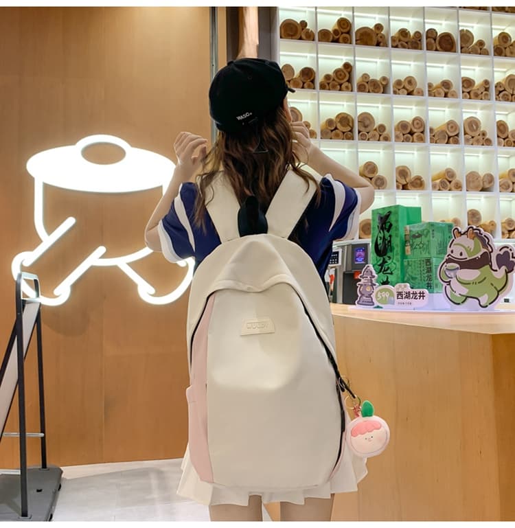 高校生 リュック 二色配色かわいい果物チャーム付き学生バッグ